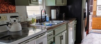 Located directly in central downtown and beach area, fish or kayak from backyard