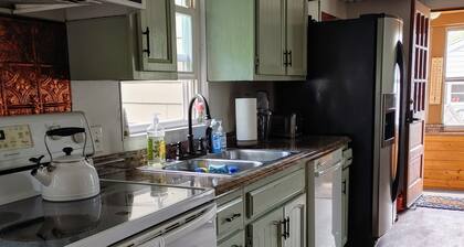 Located directly in central downtown and beach area, fish or kayak from backyard