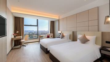 Standard Twin Room | Minibar, in-room safe, desk, laptop workspace