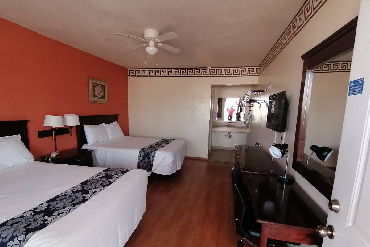 Standard Double Room | Blackout drapes, iron/ironing board (on request), WiFi (free)