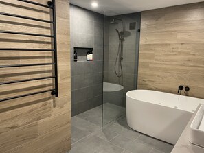 Bathtub, jetted tub, hair dryer, towels