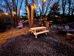 Outdoor dining - Large Private Rustic Retreat w/hot tub, fire pit, game room (bartonsville)