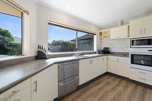 Fridge, microwave, dishwasher, toaster - Mount Holidaze - Mt Maunganui Holiday Home (Mt Maunganui)