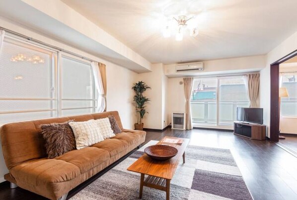 Appartement, non-fumeurs | Coin séjour | Télévision à écran plat