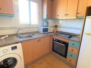 Fridge, microwave, oven, coffee/tea maker