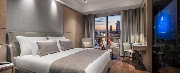 Premium bedding, memory-foam beds, minibar, in-room safe