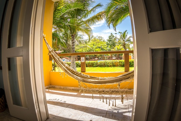 Family Quadruple Room, Pool View | Pillowtop beds, minibar, in-room safe, blackout drapes