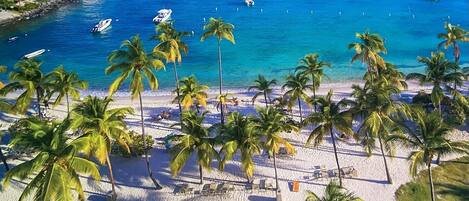 On the beach, sun-loungers, beach towels