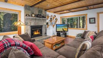 Smart TV, fireplace, DVD player, books