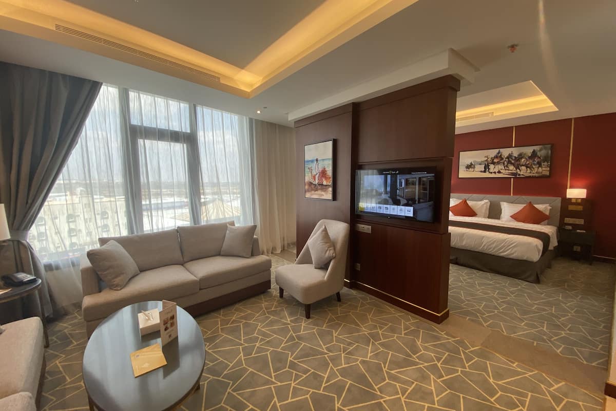 junior suite | living area | 43-inch led tv with satellite channels, tv
