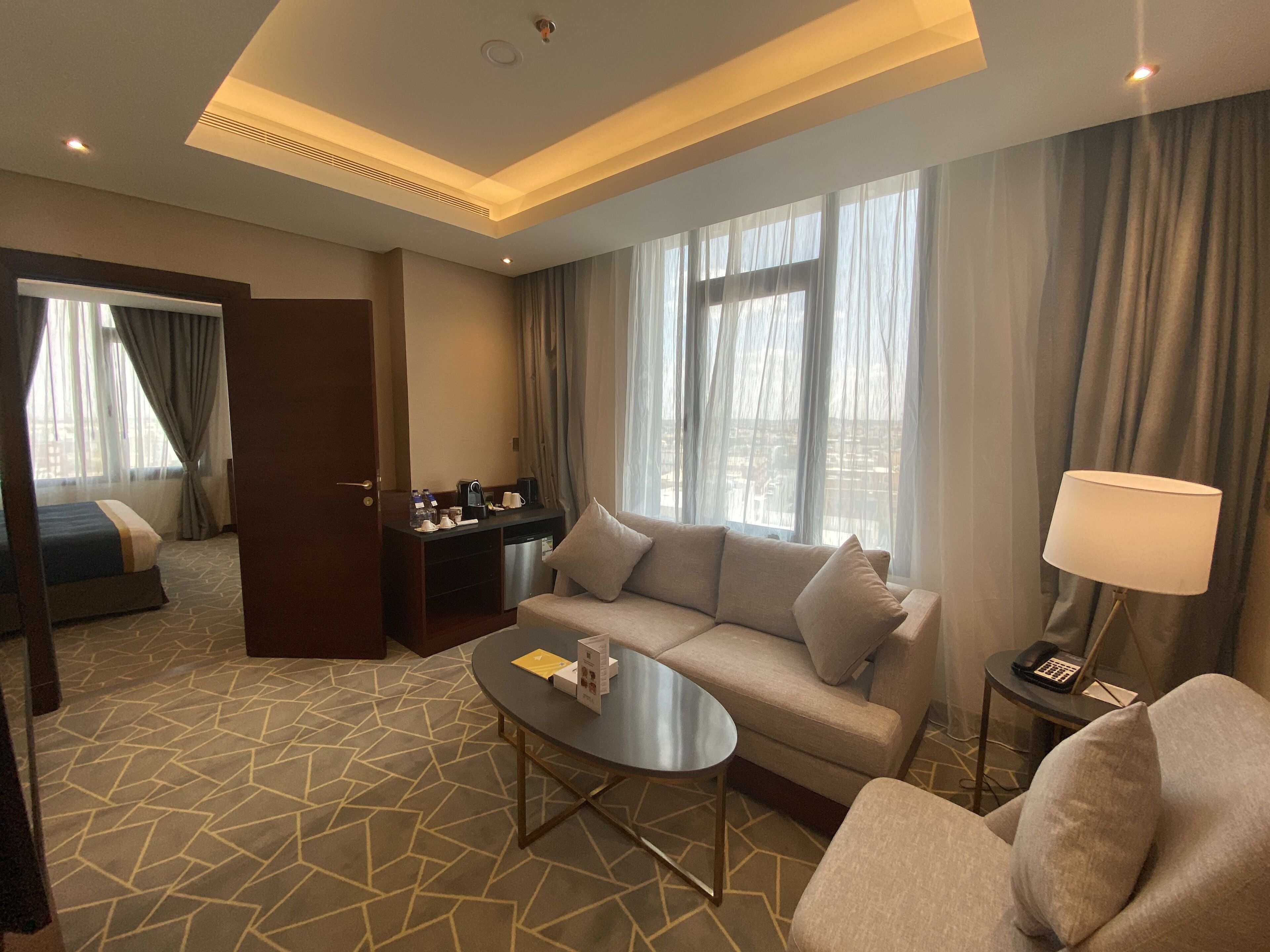 deluxe suite, 2 bedrooms | living area | 43-inch led tv with satellite channels, tv