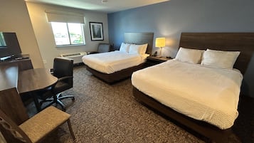 Premium bedding, pillowtop beds, desk, laptop workspace