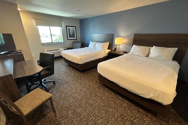 Premium bedding, pillowtop beds, desk, laptop workspace