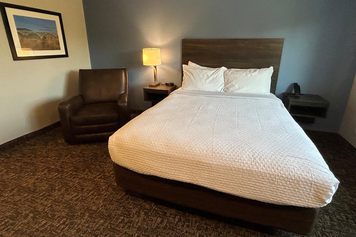 Premium bedding, pillow-top beds, desk, laptop workspace