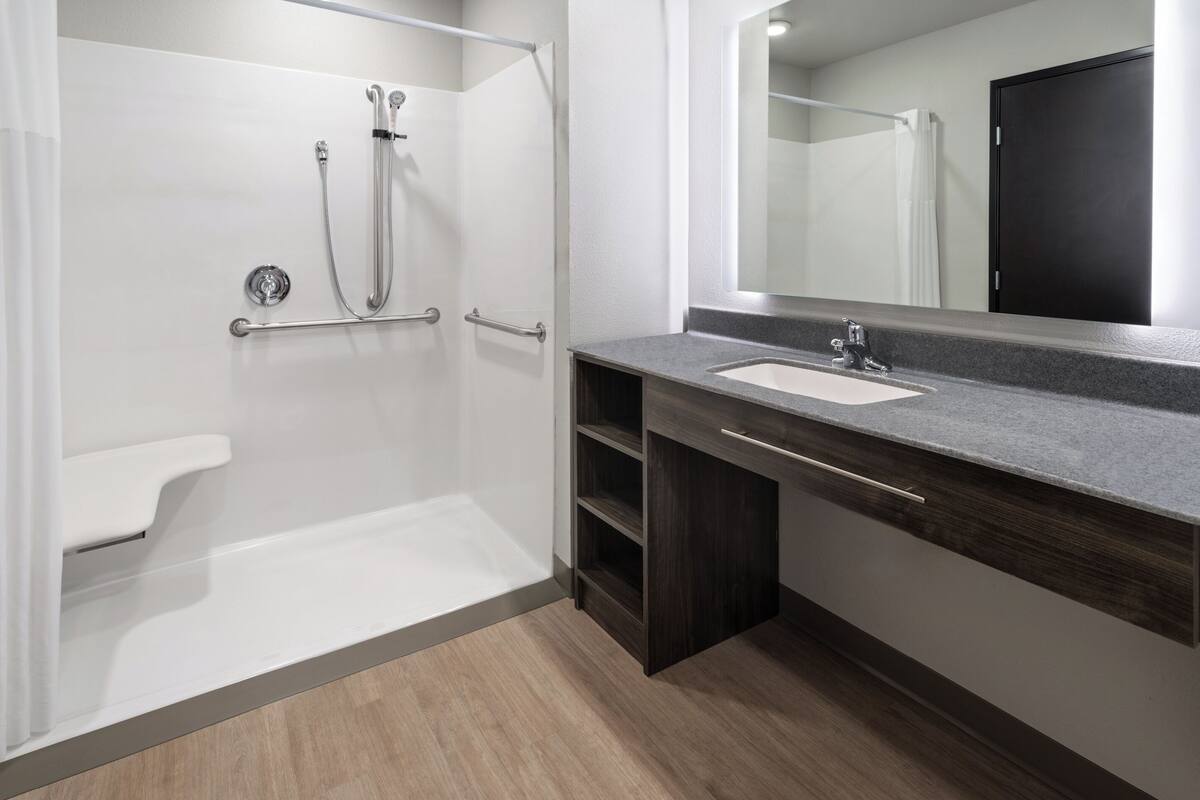 room, 1 queen bed, accessible (mobility, hearing, roll in shower) | bathroom | combined shower/bathtub, rainfall showerhead, free toiletries