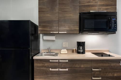 Full-size fridge, stovetop, coffee/tea maker, toaster