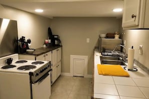 Fridge, microwave, toaster, cookware/dishes/utensils