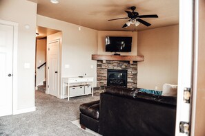 Smart TV, fireplace, DVD player, books