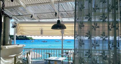 By the Sea beachfront luxury apartment with a large patio