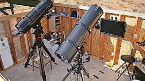 A telescope setup in a wooden structure with a desert view. - Private RV Site with Personal Observatory Access (Animas)