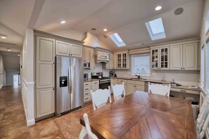 Fridge, microwave, oven, stovetop - Beachside 8BR • 1 Block from Ocean • Welcoming Visitors for the 2026 World Cup! (Surf City)