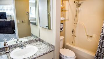 Bathtub, hair dryer, towels