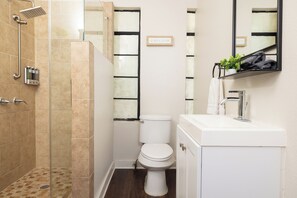 Hair dryer, towels, soap, shampoo