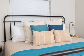 2 dormitorios, tabla de planchar con plancha, cuna de viaje y wifi