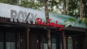 A hotel sign with the name "ROXY" and "Pet. Sorakling" in large letters. - Roxy Telok Serabang (Lundu)
