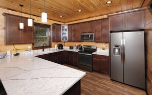 Fridge, microwave, stovetop, cookware/dishes/utensils