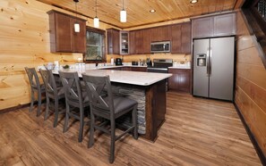 Fridge, microwave, stovetop, cookware/dishes/utensils