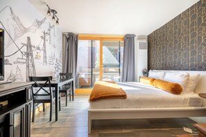 1 bedroom, desk, iron/ironing board, travel crib