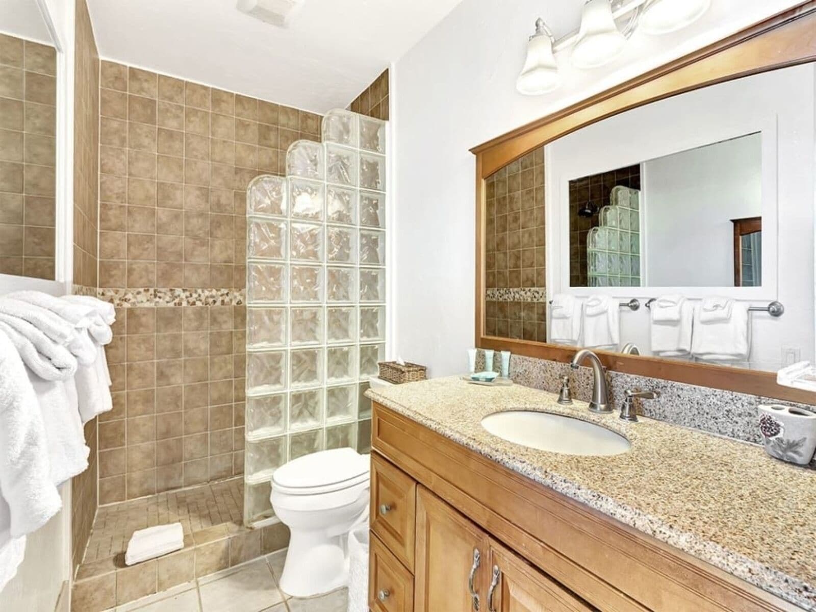 Combined shower/tub, hair dryer, towels, soap