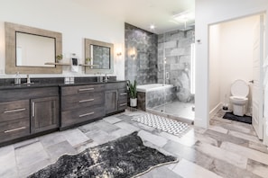 Bathtub, hair dryer, towels, soap