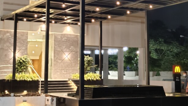 A hotel entrance with a sign reading "The Monarch." - The Monarch (Navi Mumbai)
