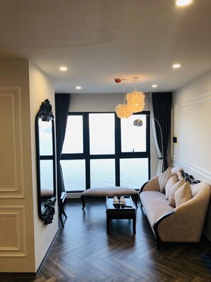Panoramic Apartment, 2 Bedrooms, Beach View | Living area | Smart TV - Gold Coast Luxury Apartment Nha Trang (Nha Trang)