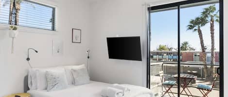 Iron/ironing board, travel crib, WiFi, bed sheets