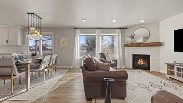 TV, fireplace, books, offices