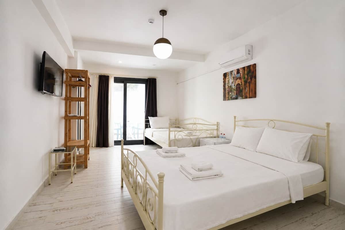 Quarto triplo família, várias camas (1) | Roupas de cama premium, frigobar, quartos à prova de som