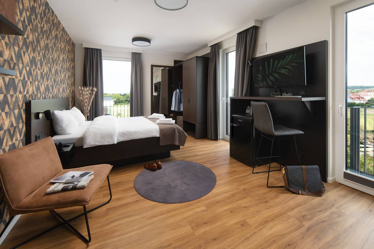 Habitación Confort, 1 cama de matrimonio, no fumadores, cocina básica | Edredones de plumas, escritorio, espacio para trabajar con un portátil