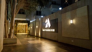 A modern hotel corridor with a large illuminated sign reading "Blue Pyramids View". - Nine Pyramids View Hotel (Giza)