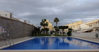 3 Bed first floor Apartment, communal pool and sea views, wifi.