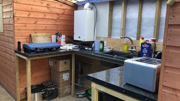 Fridge, stovetop, electric kettle, toaster