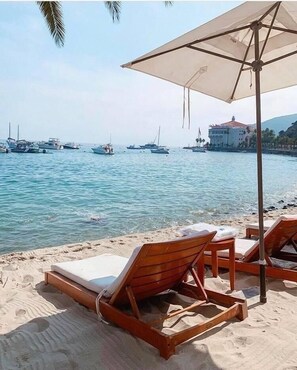 Private beach, sun loungers, beach towels