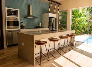 Coffee/tea maker, fridge, microwave, oven