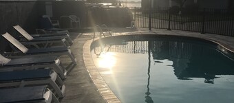 Waterfront home;heated pool & spa: walk to public beach; food, bars, live music!
