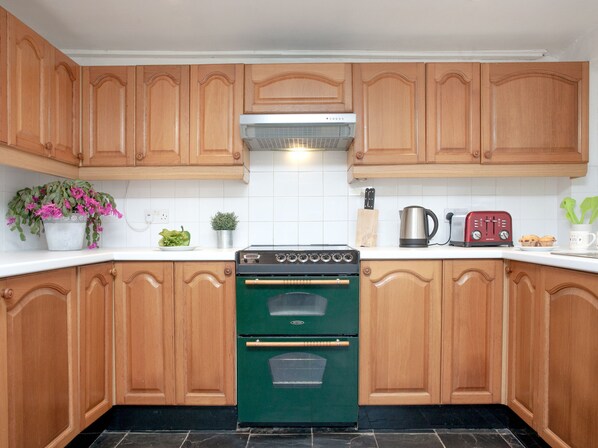 Oven, dishwasher, high chair, cookware/dishes/utensils