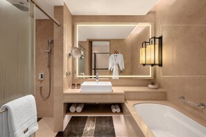 Separate tub and shower, rainfall showerhead, free toiletries - The Westin Goa (Anjuna)