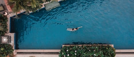 Outdoor pool, open 7:00 AM to 10:00 PM, pool umbrellas, sun loungers