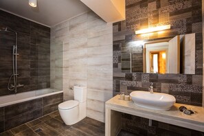 Combined shower/tub, hair dryer, towels, soap